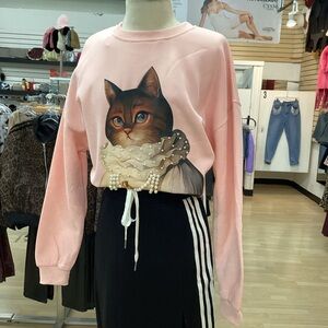 Pink sweater in a One size with design